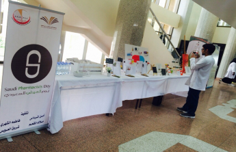 College of Pharmacy female students involved in the activity of the International Day of Pharmacist