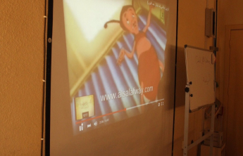 Female students conduct an activity (We made the night as a covering)