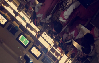 Female students conduct an activity (We made the night as a covering)