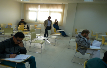 Dean of the College inspects the ongoing examinations