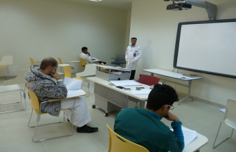 Dean of the College inspects the ongoing examinations