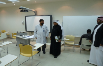 Dean of the College inspects the ongoing examinations