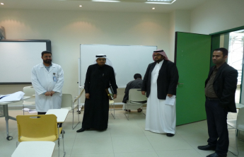 Dean of the College inspects the ongoing examinations